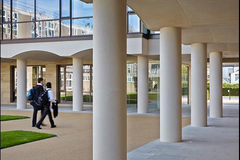 The colonnade’s columns are topped by immensely strong reinforced precast lintels that support the brick facade above